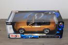 GOLD 2010 FORD MUSTANG GT CONVERTIBLE MAISTO 1:18 SCALE DIECAST METAL MODEL CAR