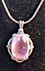 Rose quartz vintage pendant with silver tone snake chain 17'inch long.