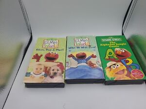 Elmos World Vhs Lot 2 Wake Up With & Babies Dogs & More 1 Sesame Street ABC Game