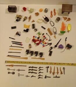 PLAYMOBIL GEOBRA VINTAGE LOT OF WEAPONS ACCESSORIES AND SMALL PARTS.