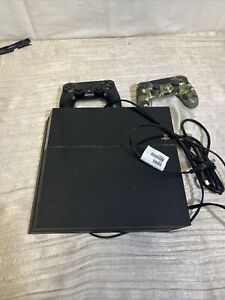 Used Black PS4 With Two Controllers Black And Camoflauge