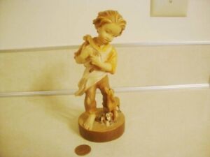 Original DOLFI Carved Wood Figure Young Boy with Dogs Puppies in Arms Vintage!