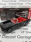 AUTO WORLD 1964 1/2 Ford Mustang Convertible Black w/ Red Interior 1:18 Diecast