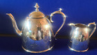 Elkington & Co Silver Plated Floral Decorated Teapot & Milk Jug dated 1879