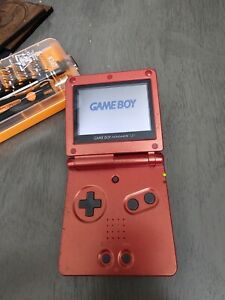 New ListingNintendo Game Boy Advance SP Handheld System - Flame Red. No sound