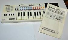 Vintage Casio PT-80 Electric Keyboard + 1 ROM Pack & Manual TESTED AND WORKS