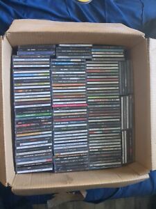CDs of various artists Van Halen , Jonny Cash, Nirvana, and much more