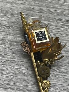Coco Chanel mini bottle on a vintage maximal art brooch 4 1/2