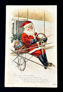 Vintage Embossed Christmas Postcard - Santa Claus in Zeppelin Airship Airplane