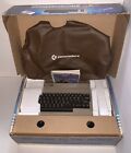 VINTAGE COMMODORE 64 COMPUTER W/BOX, DUST COVER, POWER SUPPLY, MANUAL c. 1982