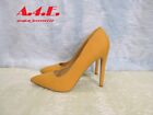 Used Yellow high heels by Delicious.   Pre-owned   Sz 11 women 9.5 mens