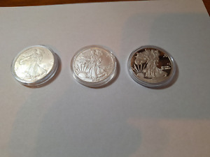 Lot of 3 $1 American Silver Eagles 2021,2022,2023 in capsules 1 oz. Silver