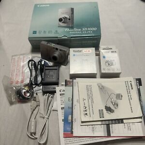 New ListingCanon PowerShot Digital ELPH SD1000 7.1MP Digital Camera - Battery + Charger