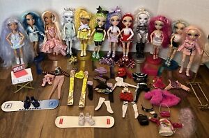 Rainbow High ~ Lot of 12 Dolls With Stands Combs Clothes Accessories