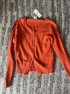 CAbi NWT Women's Sz XS Orange Lace Cut Out Sleeve Button Sweater Cardigan