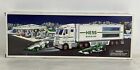 Vintage HESS Truck With Working Lights And Two Pull Back Racecars NIB Die-Cast