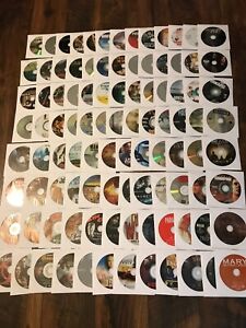 LOT OF 100 DVDs MOVIES (NO CASES OR ARTWORKS) DISCS ARE IN LIKE NEW CONDITION.