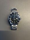 Rolex Submariner With Date 16610 Silver Oyster Bracelet with Black Bezel