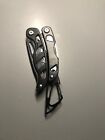 USCCA Multi-Tool - with black skeleton cover - 5 tool - Carabiner clip