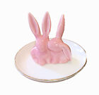 Ceramic bunny rabbit figurine on saucer