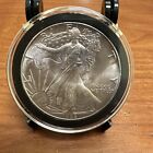 1986 1 oz American Silver Eagle Coin BU in a capsule - Some Toning
