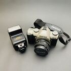 Pentax ZX-M 35 mm Film Camera with 50 mm lens, Sunpak Flash