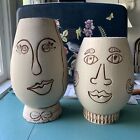 Pair Of Figural Face Vases vintage pottery