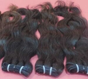 Dyed Black Processed Indian virgin raw hair is sourced from India
