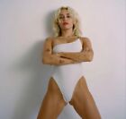 MILEY CYRUS -  IN A WHITE ONE PIECE !!!