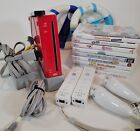 New ListingNintendo Wii Bundle Red Console w/ 2 WiiMotes, 2 Wheels and 9 Games