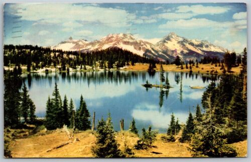 New ListingVtg La Crosse Wisconsin WI Shining Mountains and Sky Blue Waters Postcard
