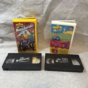 Wiggles Magical Adventure 2002 & Wiggly Wiggly World 2001 VHS hard shell Lot