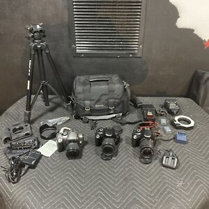 (2)Canon EOS T3 Rebel DSLR Cameras (3)EF-S 18-55mm IS II lens & Batteries & More