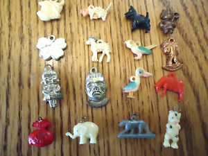 Vintage 1940's 12 Plastic & Metal Charms Trinkets Gumball Machine Game Pieces?