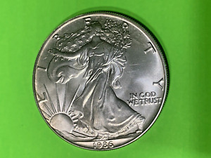 Better Date 1986 American  Eagle 1 Troy Oz .999 Fine Silver First Year UNC.