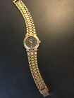 Gucci 9200L Women's Gold Watch Good Condition Swiss Made Black Background