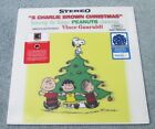 A CHARLIE BROWN CHRISTMAS VINYL! EXCLUSIVE LIMITED LENTICULAR COVER SNOWFLAKE LP