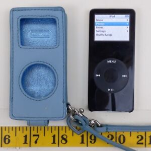 New ListingApple iPod Nano 1st Generation A1137 2GB Black & Silver Tested Blue Coach