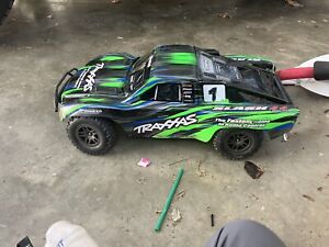 Traxxas Slash 4x4 Bl-2s With Charger And Lipo Battery And Brand New Steering