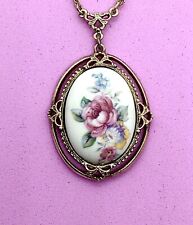 Marked, gold toned, 1928 Jewelry Company, floral, Victorian style pendant
