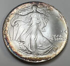 1986 American Silver Eagle Toned 1 oz .999 Fine Silver $1