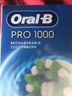 Oral-B Pro 1000 Rechargeable Toothbrush, Handle Charger Case Brush Head_9636
