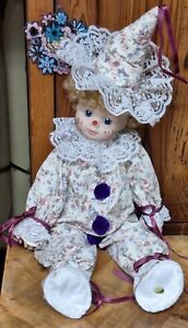New ListingAdorable Vtg Painted Cheeks Porcelain Doll In Clown Style Costume Made In China