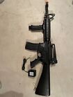Airsoft AR-4 style electrically fired