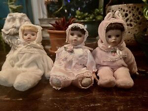 New ListingSet Of 3 Adorable Porcelian Dolls- 2 In Bunny Outfits & 1  In A Satin Dress