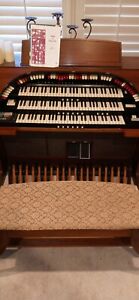 CONN ORGAN, THREE KEYBOARDS WITH FOOT PETALS, INSTRUMENTS AND EFFECTS CONTROLS