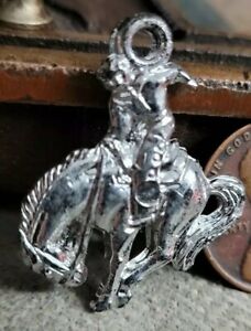 Vintage plastic silver COWBOY & BUCKING BRONCO HORSE charm prize jewelry