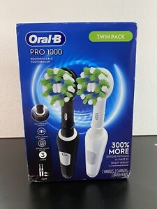New ListingOral-B Pro 1000 Electric rechargeable Toothbrush Black White Twin Pack