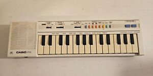 Vtg Casio PT-1 Mini Keyboard Synthesizer Made In Japan Ivory White Read descript