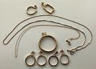 14k yellow gold scrap lot of 2 chains & 7 bezels.  16.9 grams; all KEE verified